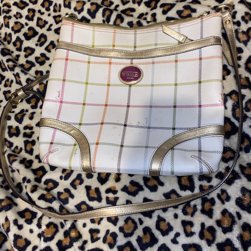 Authentic Coach Selling for cheap it does have some spots on it im not sure what